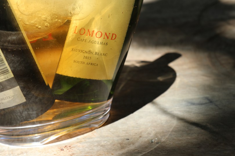 Lomond wine bottles chilling in water at the estate in Cape Agulhas South Africa.