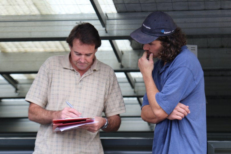 Blair Walter passing knowledge to Charlie in the Felton Road winery.