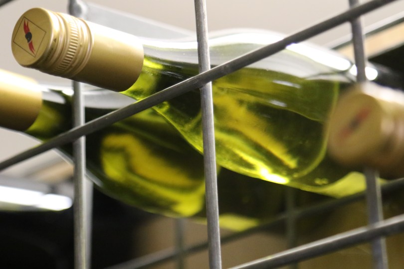 Wine bottles on the rack at Charles Sturt University Australia.