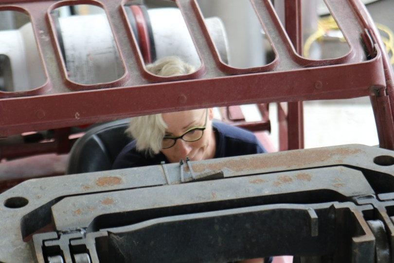 Helen driving the forklift at Ata Rangi in Martinborough, New Zealand.