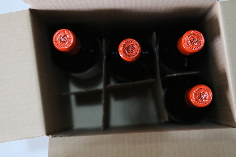 Red bottle tops at the Vina Koyle winery.